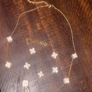 Elegant Gold and White Clover Necklace and Bracelet
